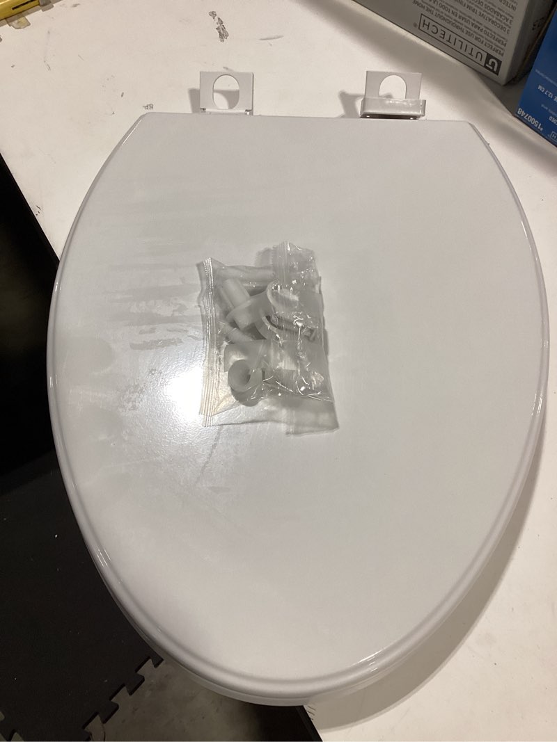Condition photo showing Good Condition for american standard mightytuff plastic white elongated soft close toilet seat