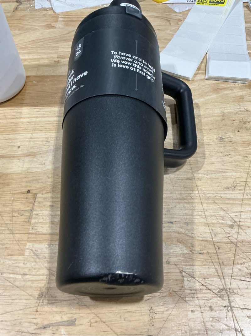Condition photo showing As Is for owala freesip tumbler insulated stainless steel water bottle with built-in straw and side handle, for travel, work, school, and sports, 40oz, bpa free, leak proof, very, very dark very, very dark 40 ounces