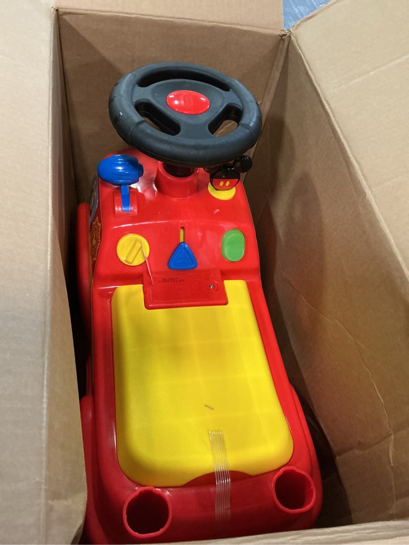 Condition photo showing Good Condition for kiddieland mickey fire truck ride-on with lights & sounds, foot-to-floor toddler vehicle, interactive dashboard, 12–36 months, 55 lb limit, batteries included
