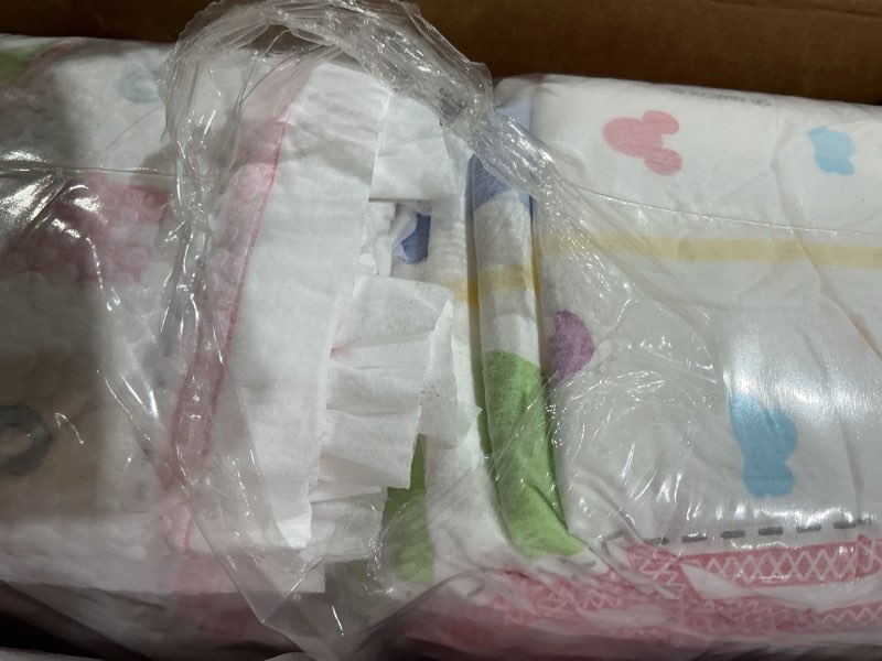 Condition photo showing As Is for huggies size 5 diapers, snug & dry baby diapers, size 5 (27+ lbs), 84 count, packaging may vary size 5 84