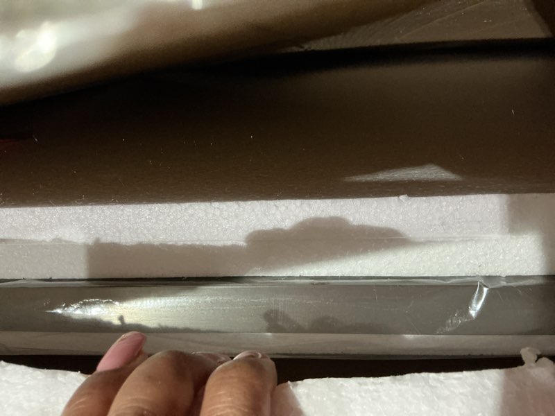 Condition photo showing As Is for andy star brushed nickel oblong mirror, 36x40 inch brushed nickel oval mirror for bathroom with stainless steel metal frame, wall mouned for bathroom, living room, entryway brushed nickel 40"l x 36"w