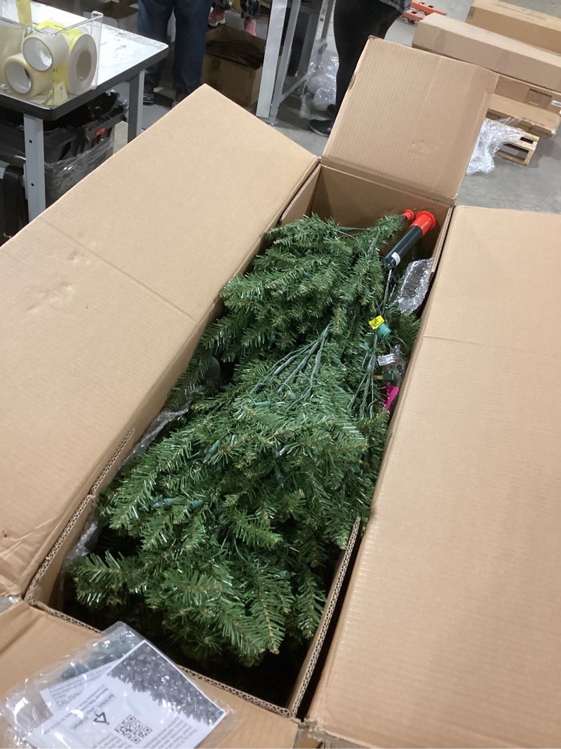 Condition photo showing As Is for National Tree Company Pre-Lit Artificial Christmas Tree  Green  Dunhill Fir  Clear Lights  Includes Stand  6.5 Feet