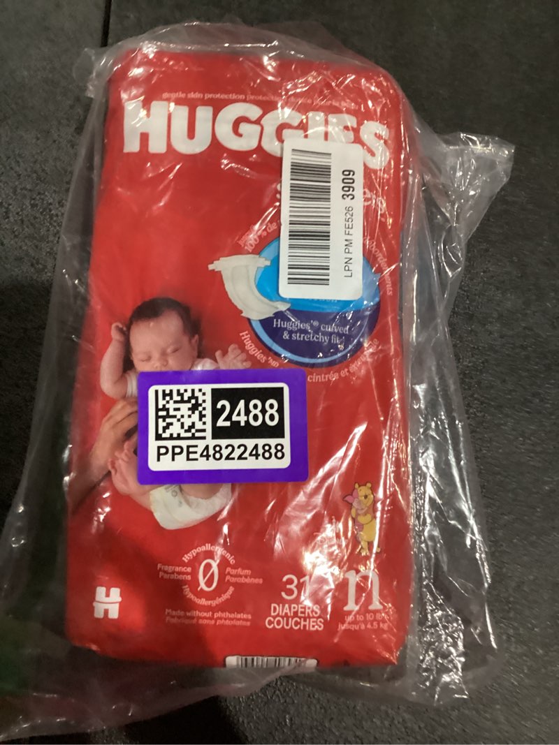 Condition photo showing New/Like New for huggies size newborn diapers, little snugglers baby diapers, size newborn (up to 10 lbs), 31 count, packaging may vary newborn 31