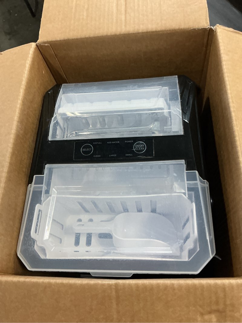 Condition photo showing As Is for frigidaire countertop portable, 26 lb per day bullet ice maker machine (black stainless steel)
