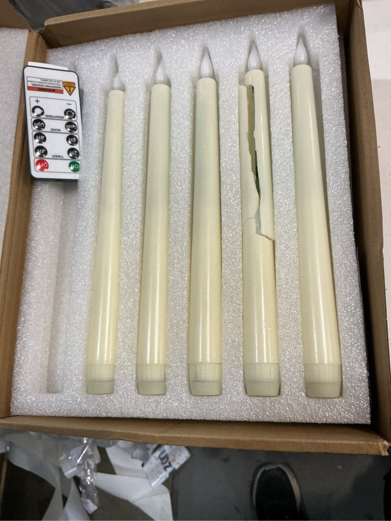 Condition photo showing As Is for homemory 24 pcs waxy flameless taper candles with remote, led flameless candlesticks classic tall candle, flickering battery operated taper candles for bedroom, dining room, ivory, 9.6 inches c-ivory 24