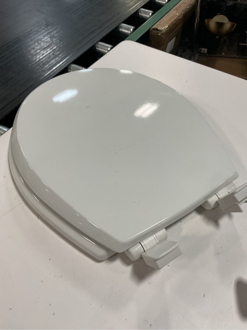 Condition photo showing As Is for 2f1e10-02 heavy duty residential commercial plastic slow close elongated toilet seat with adjustable hinge