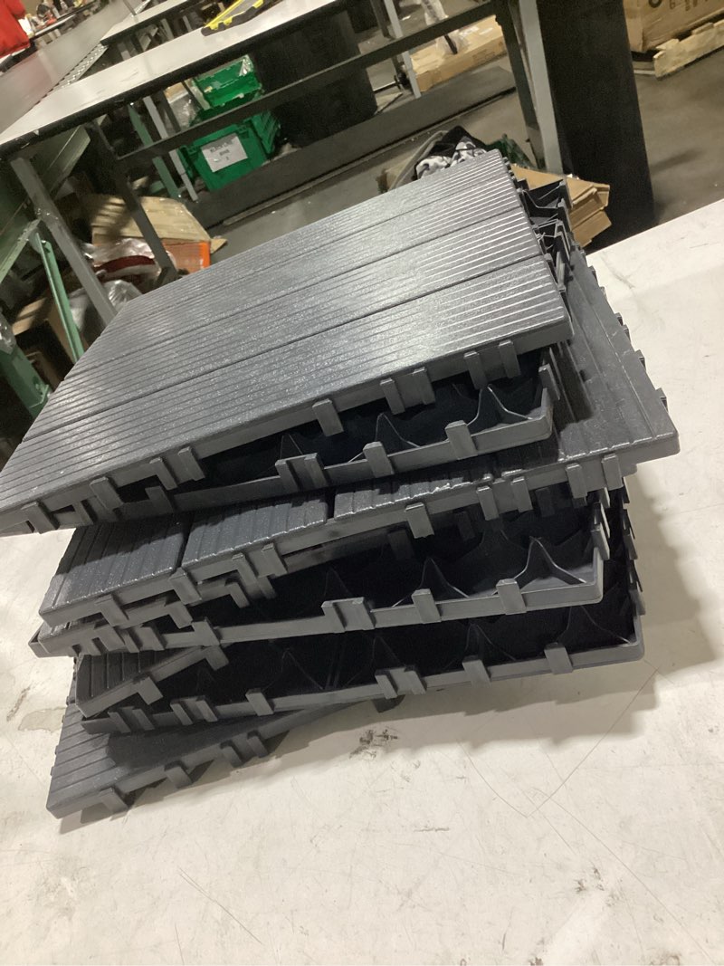 Condition photo showing As Is for (similar to )8 pcs 12x12 inch interlocking deck tiles - waterproof all-weather outdoor patio flooring for pool, balcony, backyard, porch & garden, dark grey