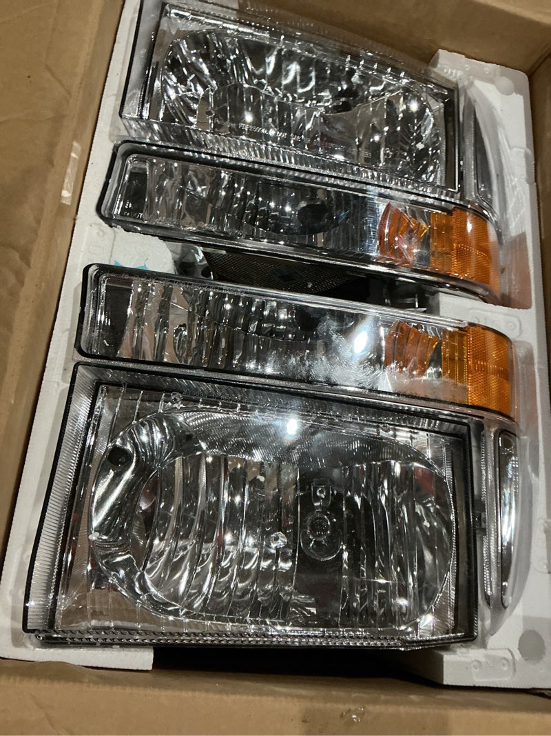 Condition photo showing Good Condition for headlight assembly w/bulbs for 1999-2004 ford super duty f250 f350 f450 f550,00-04 ford excursion headlamp replacement with bumper signal corner light (not for sealed beam models) pair set chrome | with high & low beam bulbs oe replacement