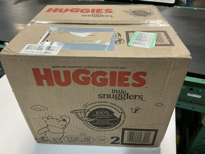 Condition photo showing New/Like New for huggies size 2 diapers, little snugglers baby diapers, size 2 (12-18 lbs), 186 count (3 packs of 62), packaging may vary size 2 186