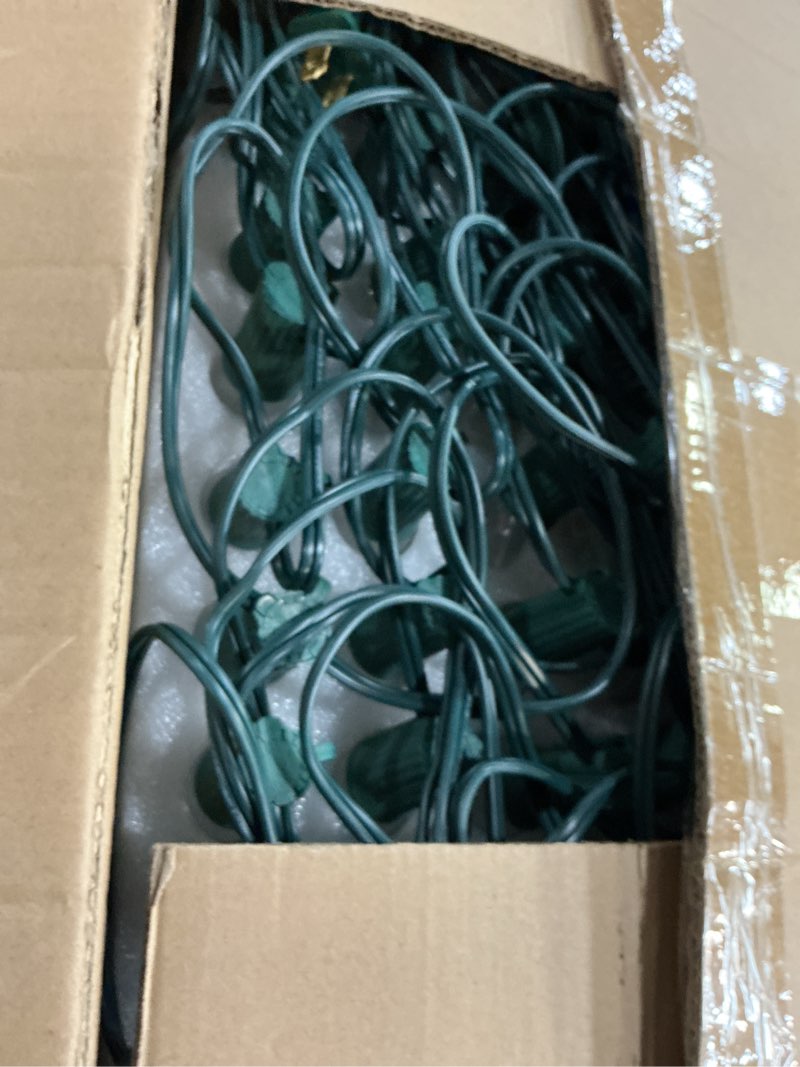 Condition photo showing New/Like New for C9 Clear Christmas String Lights, 100 Feet Waterproof Vintage Christmas Tree Lights, Outdoor Roofline String Lights with 100 Clear Bulbs for Patio Garden Holiday Indoor Home Decoration, Green Wire 100FT Clear Bulb Green Wire