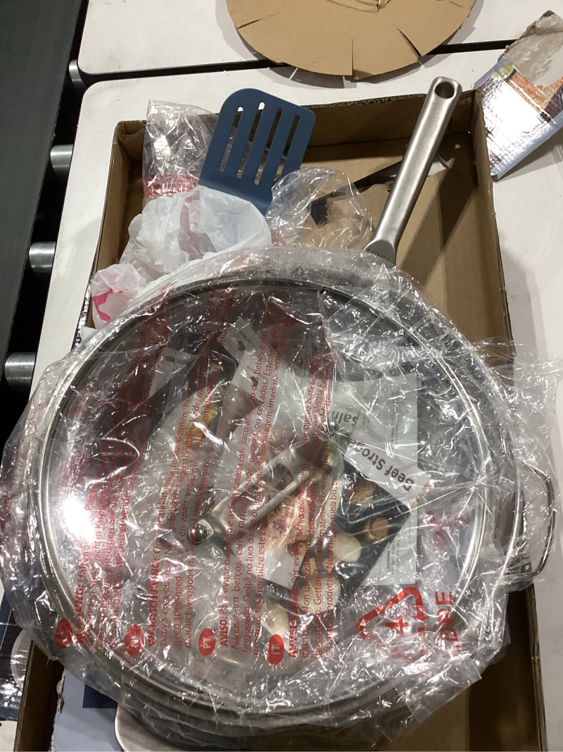 Condition photo showing Good Condition for ninja, cookware, steamer, strainer basket, glass lid and spatula, foodi neverstick possiblepan, premium set with 4-quart capacity pan, nonstick, durable, oven safe cookware, cherry tart, cw102bl macaron blue