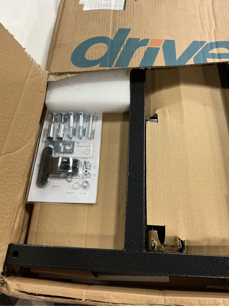 Condition photo showing New/Like New for drive medical overbed table with wheels - secure height adjustment for comfort - non tilt surface - smooth rolling design - home & hospital use - woodgrain laminate top - silver vein silver vein table