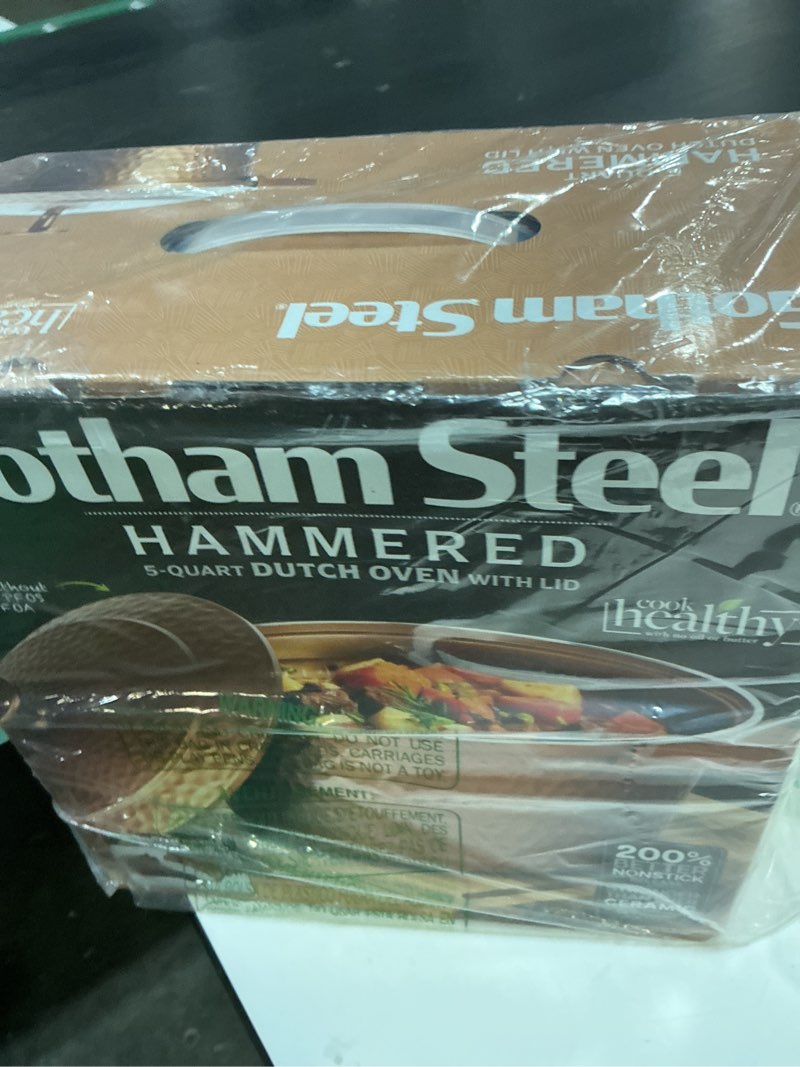 Condition photo showing New/Like New for gotham steel hammered 5 qt lightweight dutch oven pot with lid & holders, ceramic non toxic, oven safe & even heat retaining dutch oven for bread baking sourdough, soup, 70% lighter than cast iron copper hammered