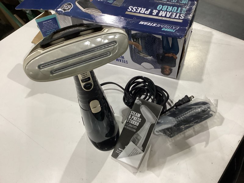 Condition photo showing New/Like New for conair handheld garment steamer for clothes, turbo extremesteam 1875w fabric steamer, portable handheld design, strong penetrating steam, amazon exclusive, black