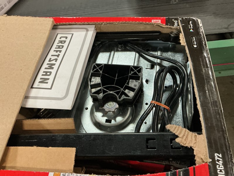 Condition photo showing As Is for CRAFTSMAN 1/2 HP Smart Garage Door Opener - myQ Smartphone Controlled - Chain Drive, Wireless Keypad Included, Model CMXEOCG472, Red