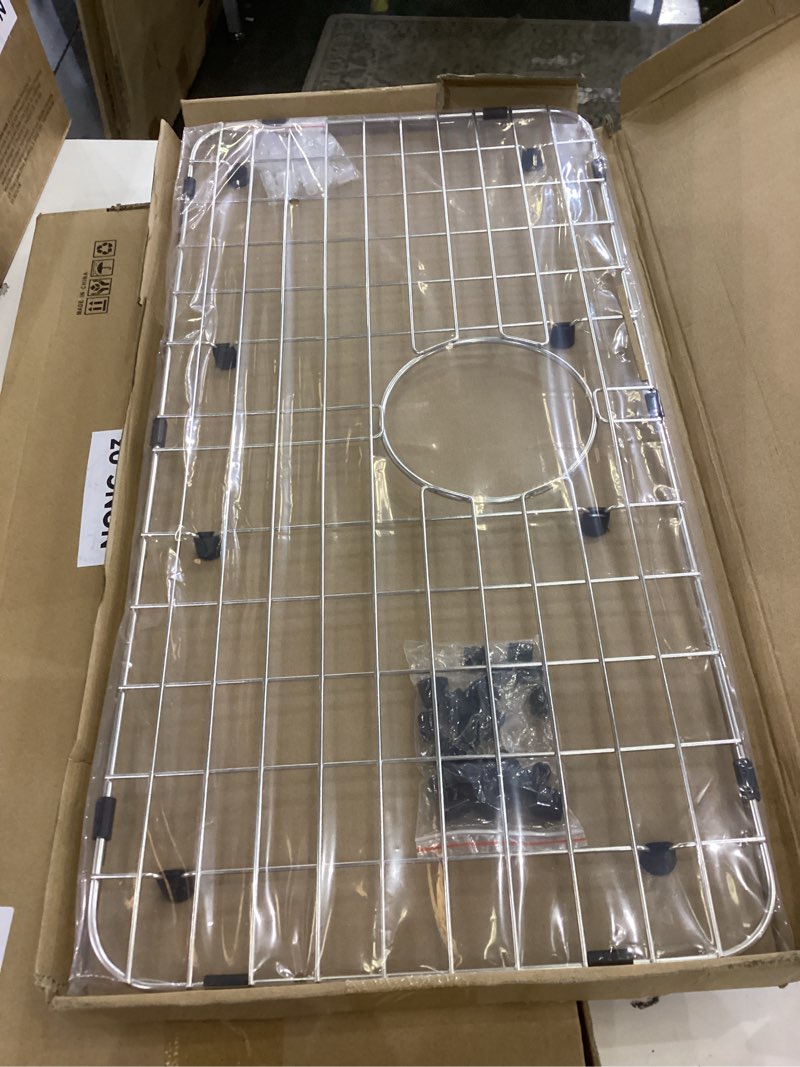 Condition photo showing New/Like New for Serene Valley 25-1/4" X 12-1/2“ Sink Grid, Rear Drain with Corner Radius 1-1/2", NLW2513R