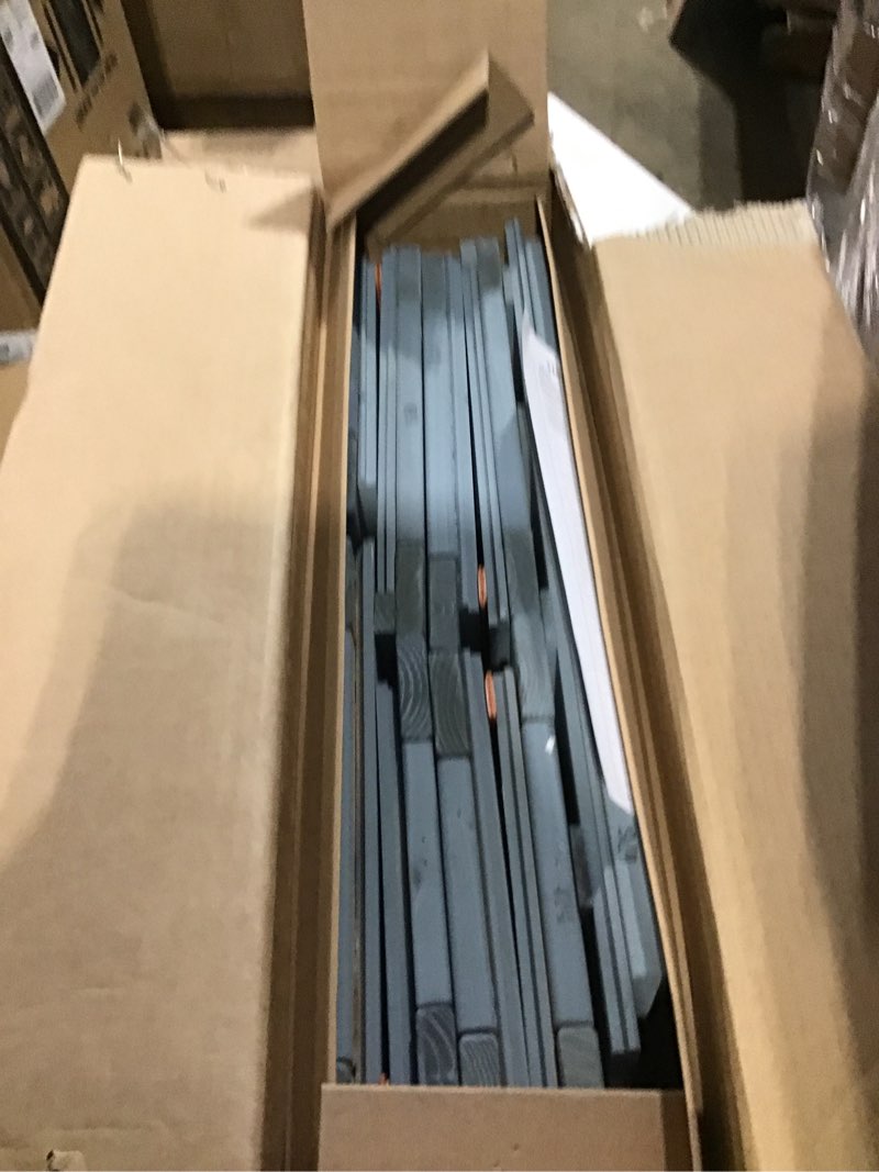 Condition photo showing As Is for Backyard Discovery Beacon Heights Elevated Cedar Wooden Kids Playhouse with Wave Slide, Play Kitchen, Wrap-Around Deck, Flat-Step Ladder, Half Door, Windows, Bell, and Growth Chart for Outdoor Play Blue