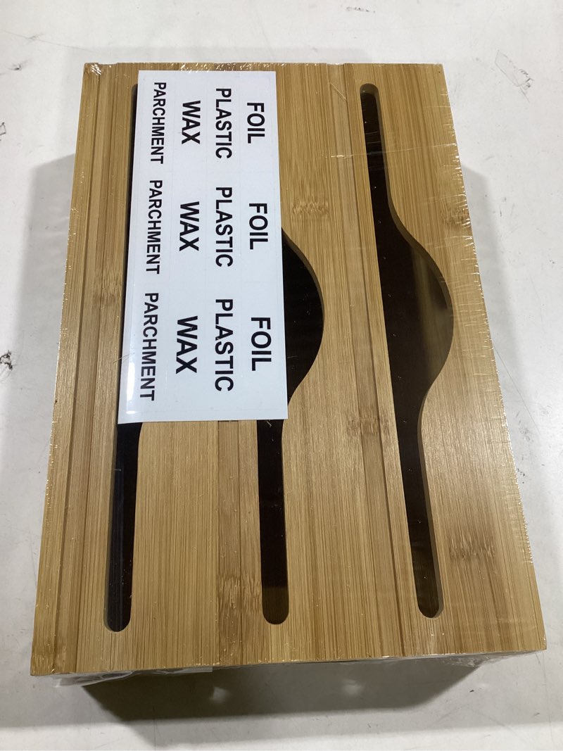Condition photo showing New/Like New for Similar SpaceAid WrapNeat 3 in 1 Wrap Organizer with Cutter and Labels, Plastic Wrap, Aluminum Foil and Wax Bamboo Dispenser for Kitchen Storage Organization Holder for 12\" Roll (Natural) 3-Slot, 3\"Tall 01 Natural