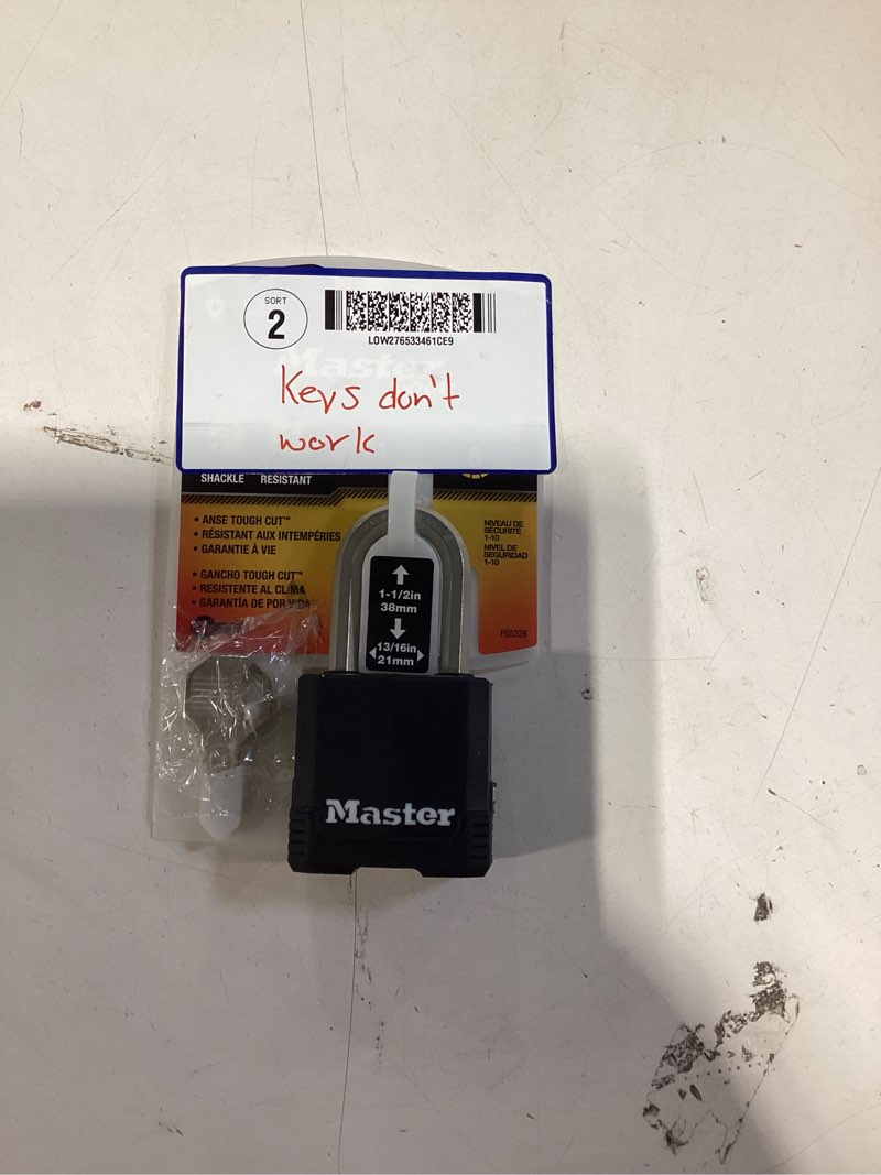 Condition photo showing As Is for master lock 1-7/8 in. h x 1-3/16 in. w x 1-3/4 in. l vinyl covered dual ball bearing locking padlock