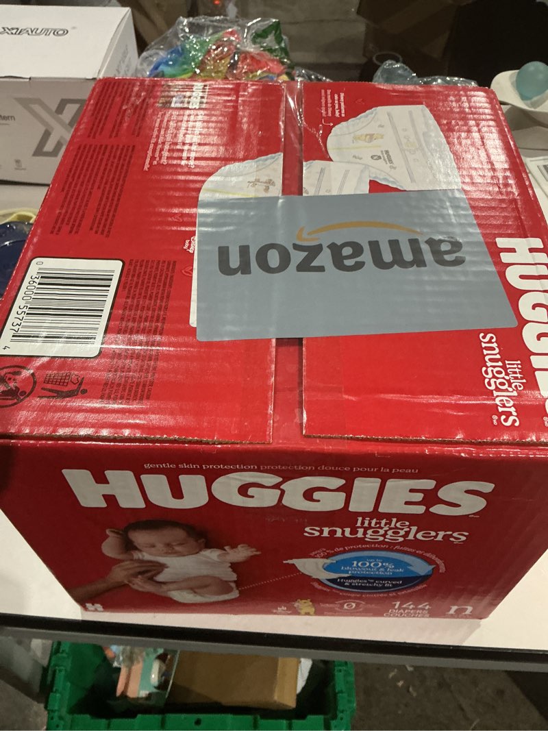 Condition photo showing Good Condition for huggies size newborn diapers, little snugglers baby diapers, size newborn (up to 10 lbs), 144 count, packaging may vary