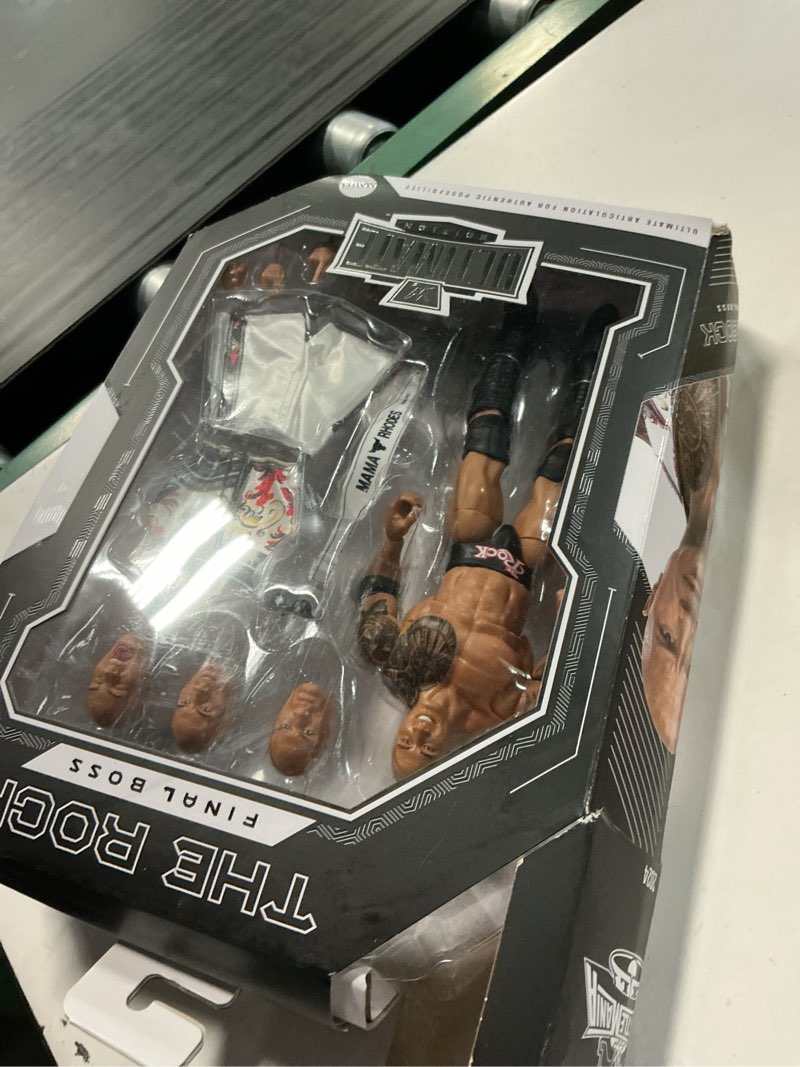 Condition photo showing Good Condition for mattel wwe ultimate edition action figure & accessories set, the rock final boss 6-inch collectible with swappable heads & hands, 30 articulation points