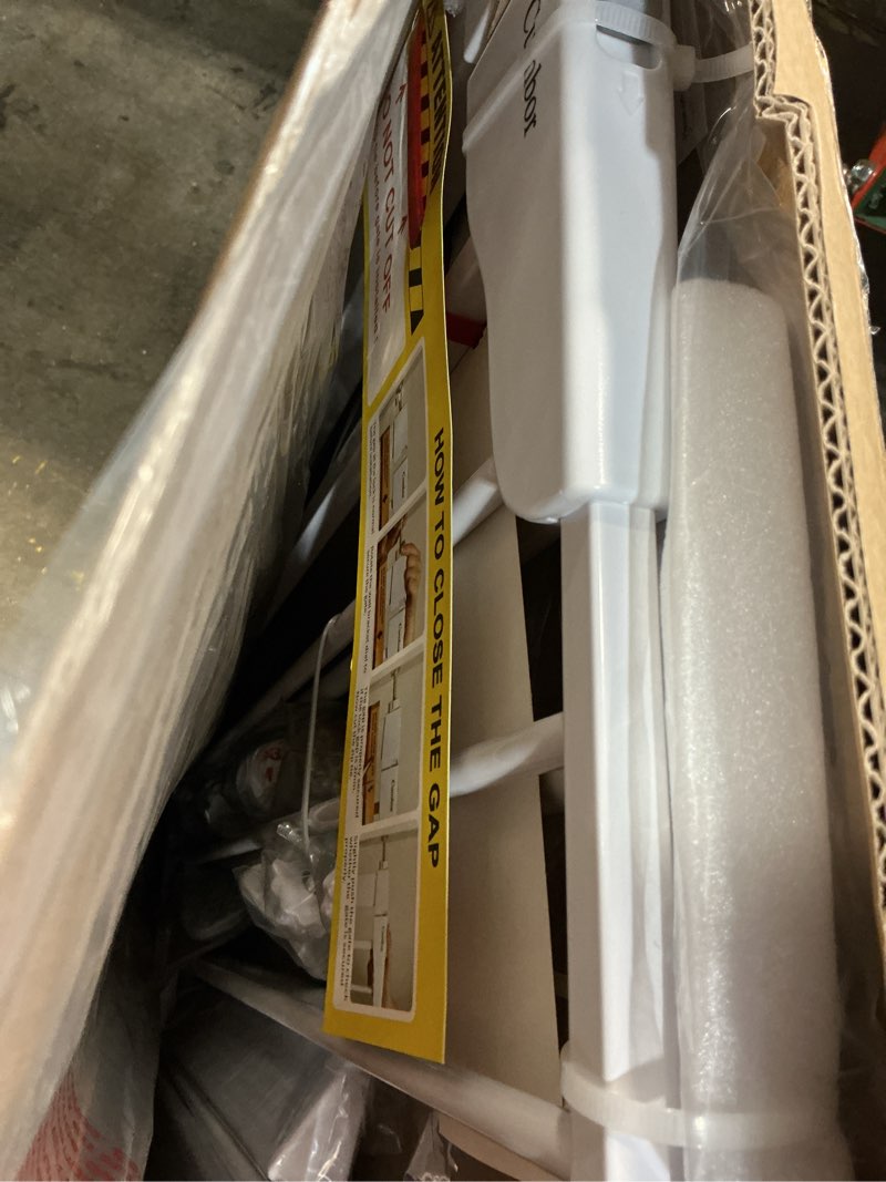 Condition photo showing New/Like New for cumbor safety gate the safety gate adjusts to fit openings between 29.7 and 48 inches wide, white