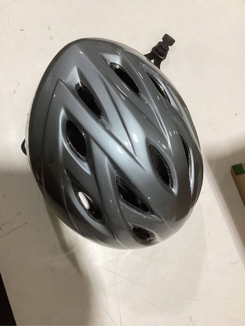 Condition photo showing Good Condition for Bell Adult Reflex Helmet, Solid One Size Solid Light Titanium
