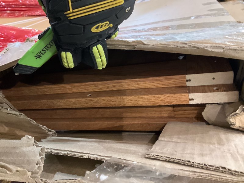 Condition photo showing As Is for Sauder storage cabinet