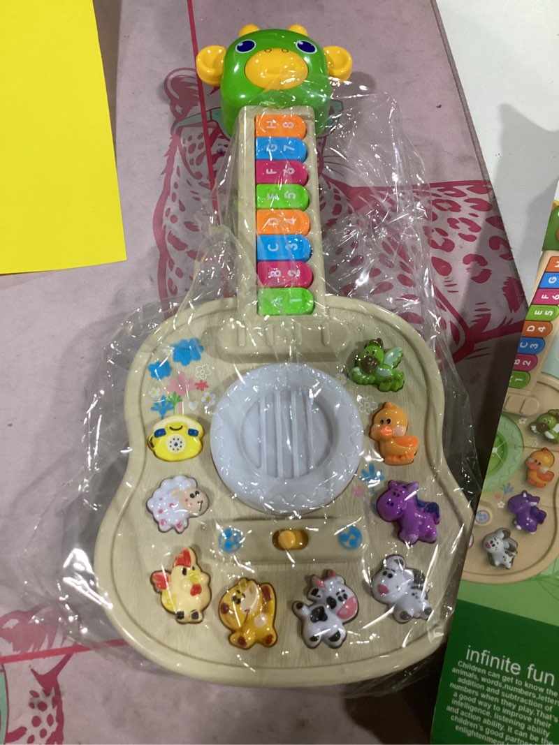 Condition photo showing As Is for toddler montessori toys for 1 year old boy girl, birthday gifts for 1 year old boys girls, toddler educational learning guitar toys with led-light & animals sounds, 1st birthday boy girl gifts