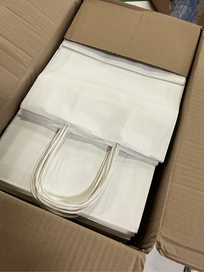 Condition photo showing Good Condition for mlyta 100 pack 8x4.75x10 inch medium white kraft paper gift bags with handles bulk for goodie, party favor, brithday grocery shopping, small business wedding retail craft treat, merchandise sacks