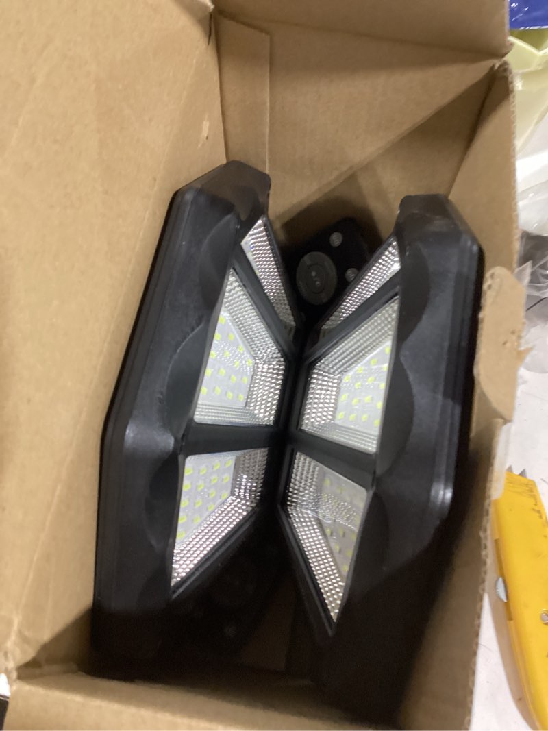 Condition photo showing Good Condition for Solar Lights Outdoor, 168LED 6500K Flood Light Dusk to Dawn, 8 Sides Solar Outdoor Lights with Motion Sensor, IP66 Waterproof Solar Street Lights Outdoor for Yard, Pools(2 Pack)