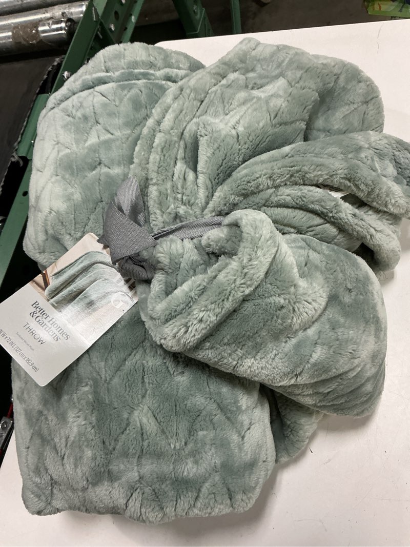 Condition photo showing As Is for better homes & gardens textured velvet plush adult throw, 50” x 72”, green river