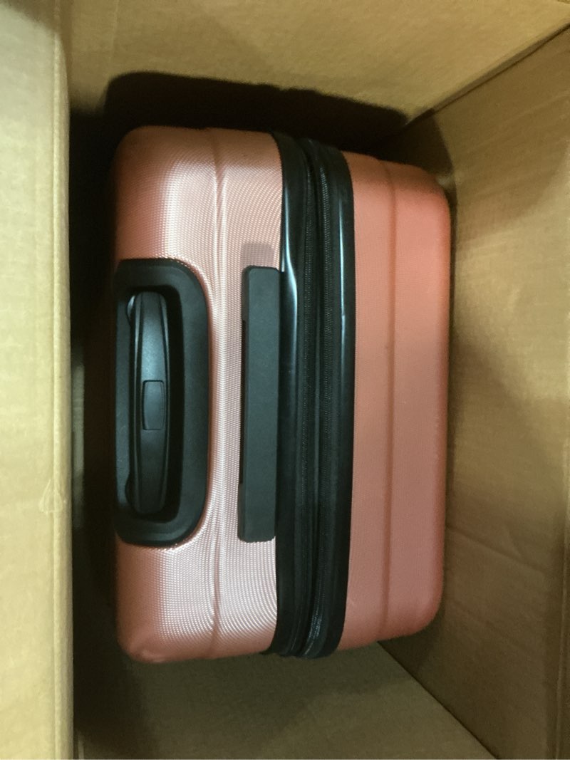 Condition photo showing Good Condition for amazon basics 30" hardside large checked luggage, expandable for up to 15% more space, scratch-resistant surface, four multi-directional wheels, rose gold rose gold large checked