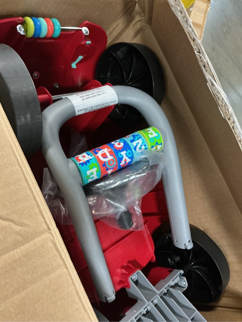 Condition photo showing Good Condition for radio flyer busy buggy, for toddlers 1-3, 3-in-1 push walker ride on car with 17 sensory activities, anti-tip feature, under-seat storage, horn and gears, 42 lb capacity, toddler ride on toys red
