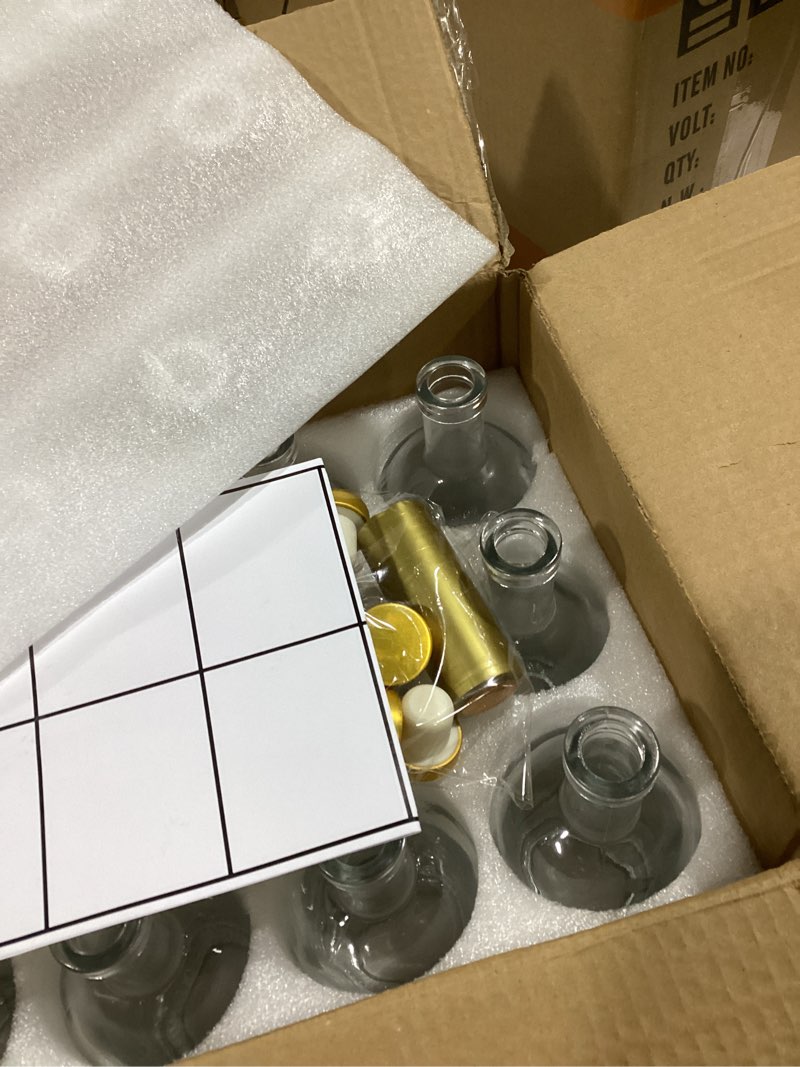 Condition photo showing Good Condition for 12 oz/375ml Clear Glass Bottles with Cork, 12 Pack Clear Liquor Bottles, Thick Heavy Base Airtight Wine Bottles for Beverages, Liquor, Whiskey, Oil, Vinegar, Wedding Favors & Crafts Clear 12oz/ 375ml