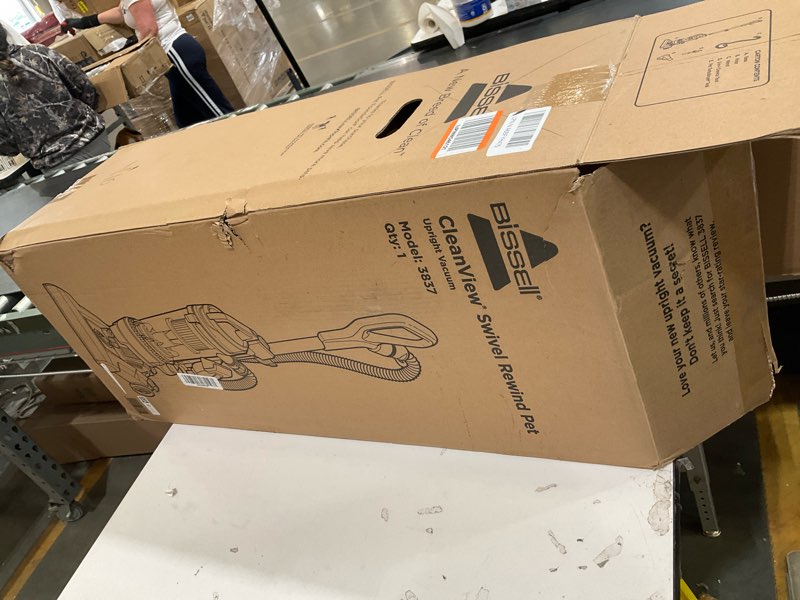 Condition photo showing As Is for bissell cleanview swivel rewind vacuum with automatic cord rewind, turboeraser upholstery tool, triple action brush roll, swivel steering, extension wand, easy-empty dirt tank, multi-cyclonic suction blue