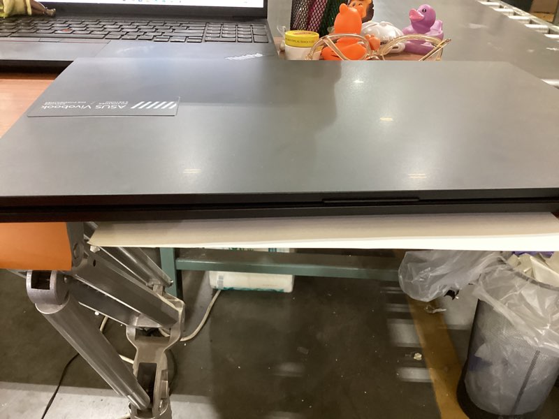Condition photo showing As Is for asus vivobook (no power cord )
