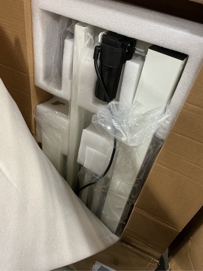 Condition photo showing Good Condition for JOY worker Small Electric Standing Desk, 40" x 20" Whole Piece Height Adjustable Desk with Memory Controller, White Sit to Stand Desk Workstation for Home Office