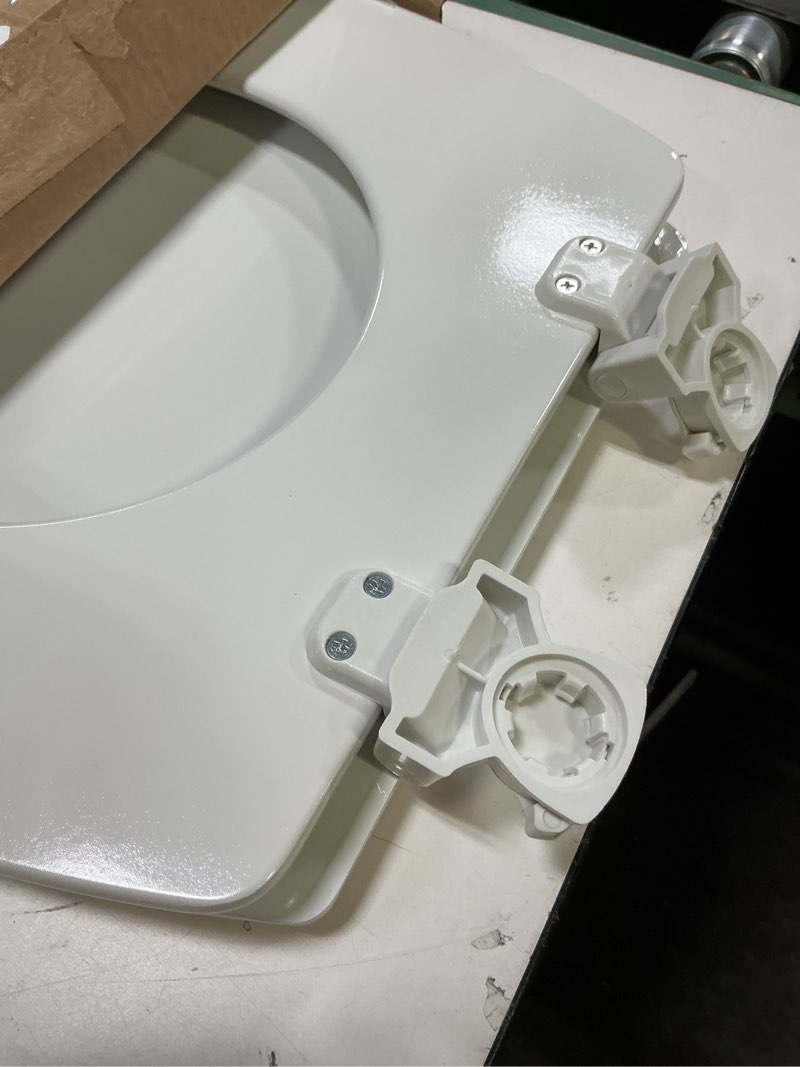 Condition photo showing As Is for Bemis 1500EC Durable Wood Toilet Seat with Easy Clean Hinges, Made in USA, Elongated, White