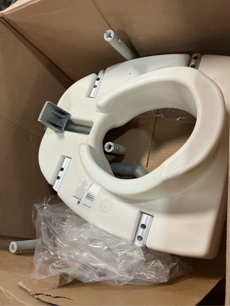 Condition photo showing As Is for medline 5  elongated raised toilet seat  with lock and removable padded arms