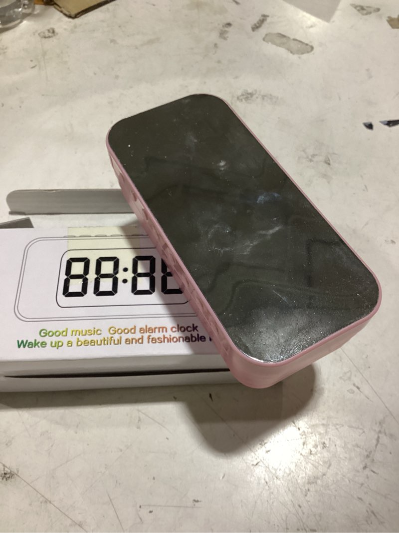 Condition photo showing As Is for alarm clock speaker, rechargeable large volume mirror display portable digital clock speaker with for travel, outdoor (pin k)