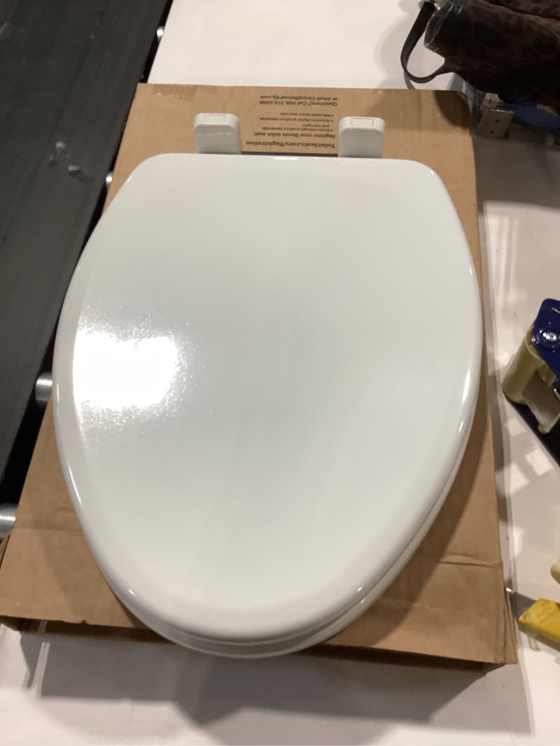 Condition photo showing Good Condition for mayfair linden slow close toilet seat, non slip heavy duty wood, easy install, elongated, white elongated traditional hinge