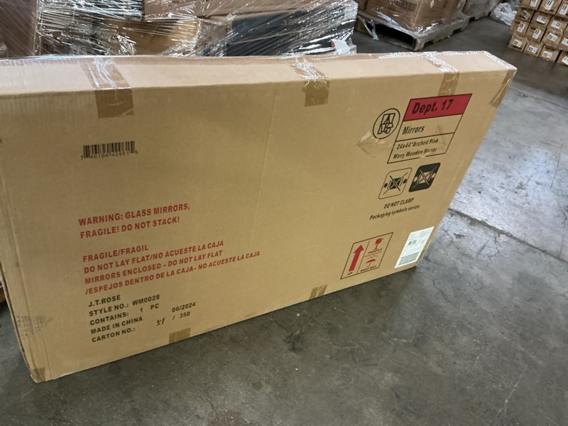 Condition photo showing New/Like New for 24” x 44\" arched pink wavy wood frame mirror