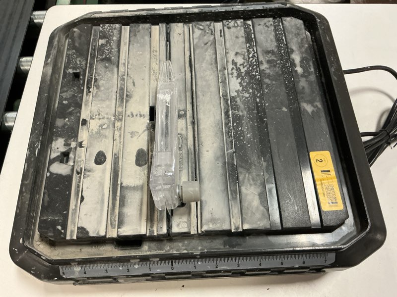 Condition photo showing As Is for project source 4.1 -amp 4.5-in -blade tabletop tile saw