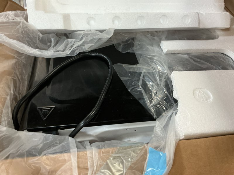 Condition photo showing As Is for 0.7 cu. ft. 700-watt compact countertop microwave oven in black