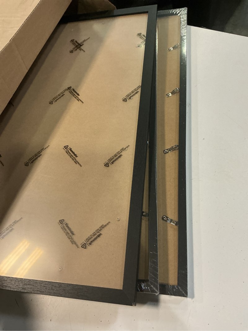 Condition photo showing Good Condition for a plus max 16x24 picture frame set of 3 black light weight wall mount | 16 x 24 inch black wood-grain engineered wood material frame for 16by24 rectangular photo poster - 3 packs/black/16x24 black 16x24 3 packs