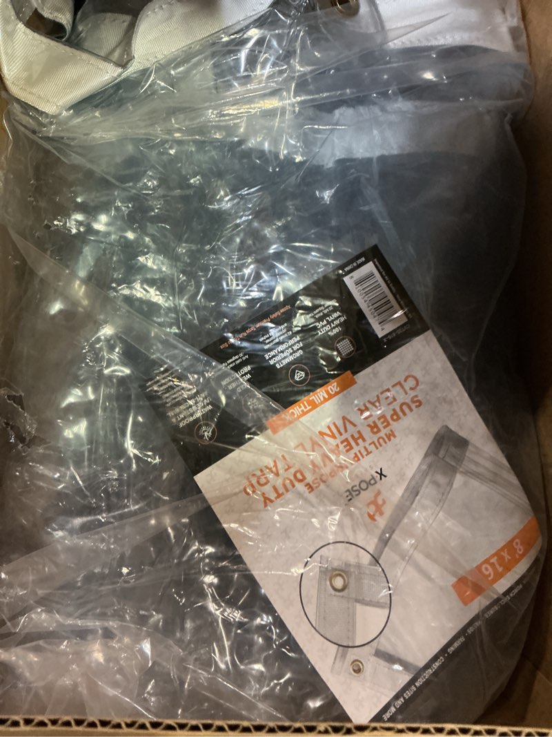 Condition photo showing As Is for 8' x 16' Clear Vinyl Tarp - Super Heavy Duty 20 Mil Transparent Waterproof PVC Tarpaulin with Brass Grommets - for Patio Enclosure, Camping, Outdoor Tent Cover, Porch Canopy - by Xpose Safety 20 Mil 8 Feet x 16 Feet