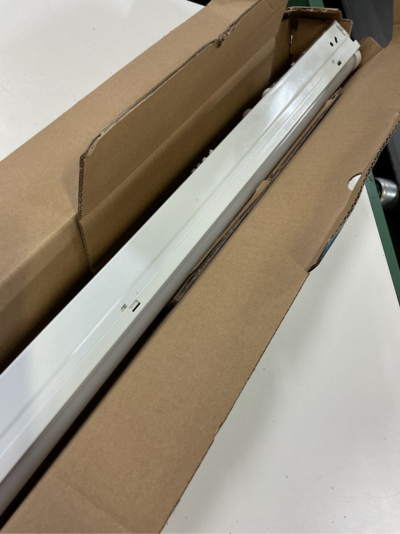 Condition photo showing As Is for utilitech 1 -light warm white integrated led strip light fixture