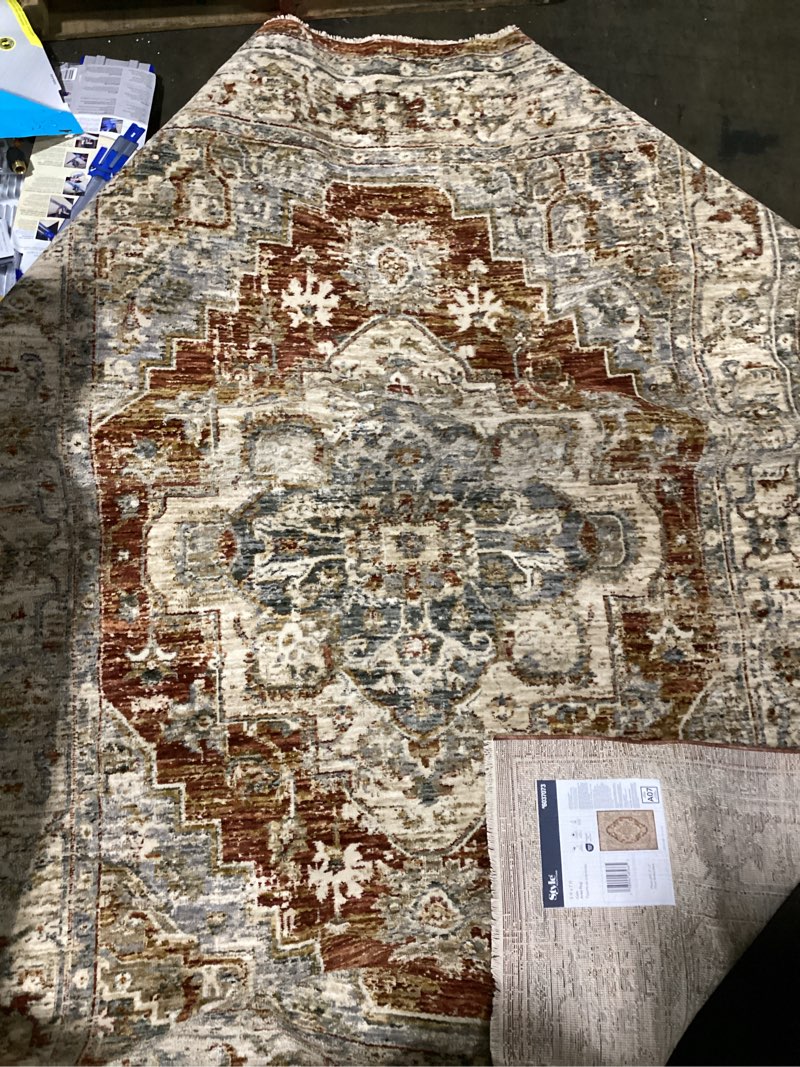 Condition photo showing New/Like New for  style selections cain 5 x 7   (ft) loomed polyester rust rectangular indoor medallion