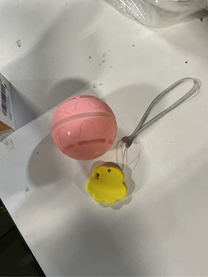 Condition photo showing Good Condition for Rollie Pet Electric Dog Toy, Interactive Chew Bouncing Balls for Dogs, Electric Launcher Durable Automatic Rolling Vibrating Dog Balls for Pets, Busy Ball for Small&Large Pets (Pink Remote Control)